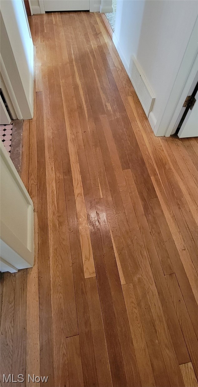 6416 Milan Road Sandusky, OH 44870 - Photo 20 of 34 Hallway hardwood floors