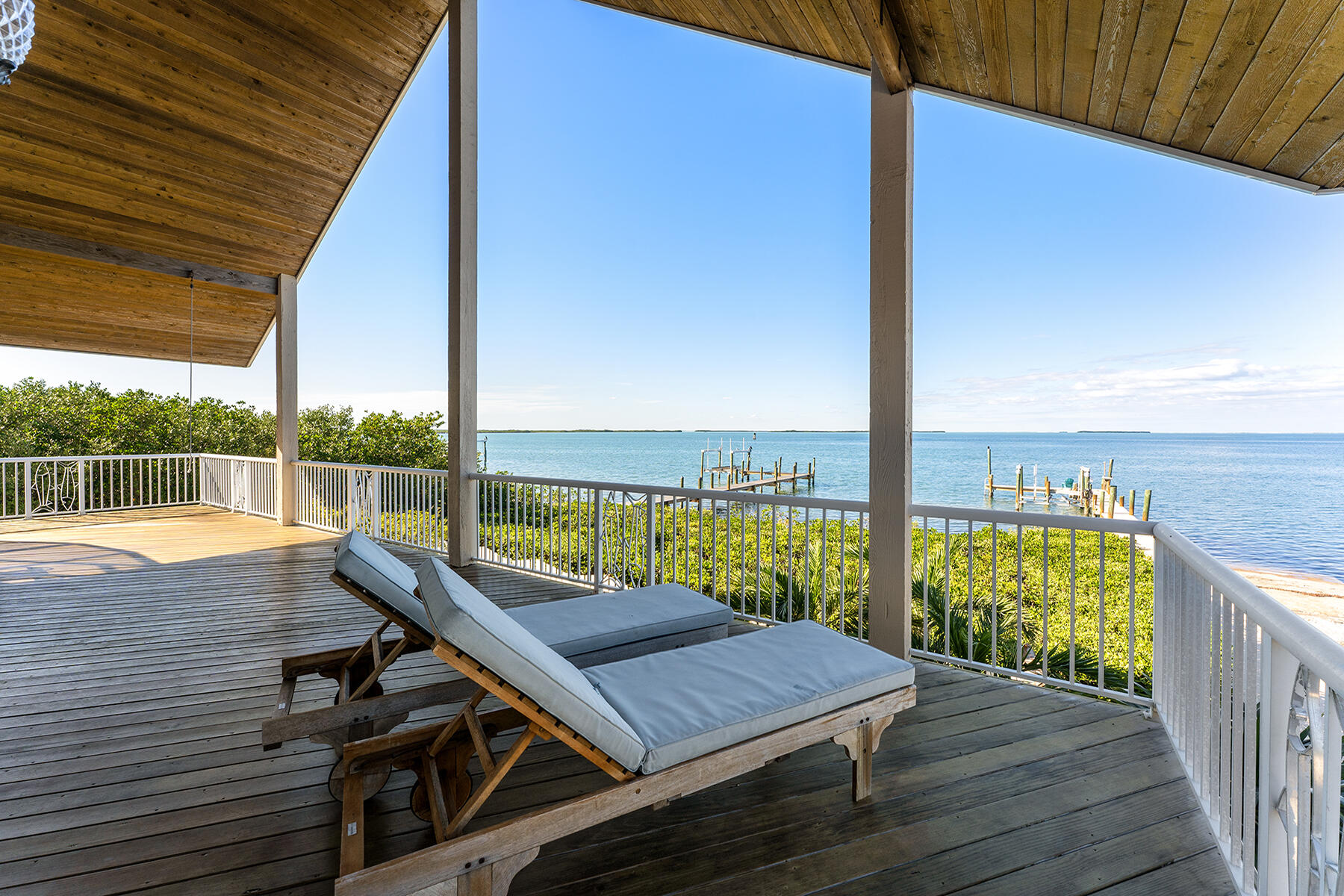 Wide porches with custom ceilings