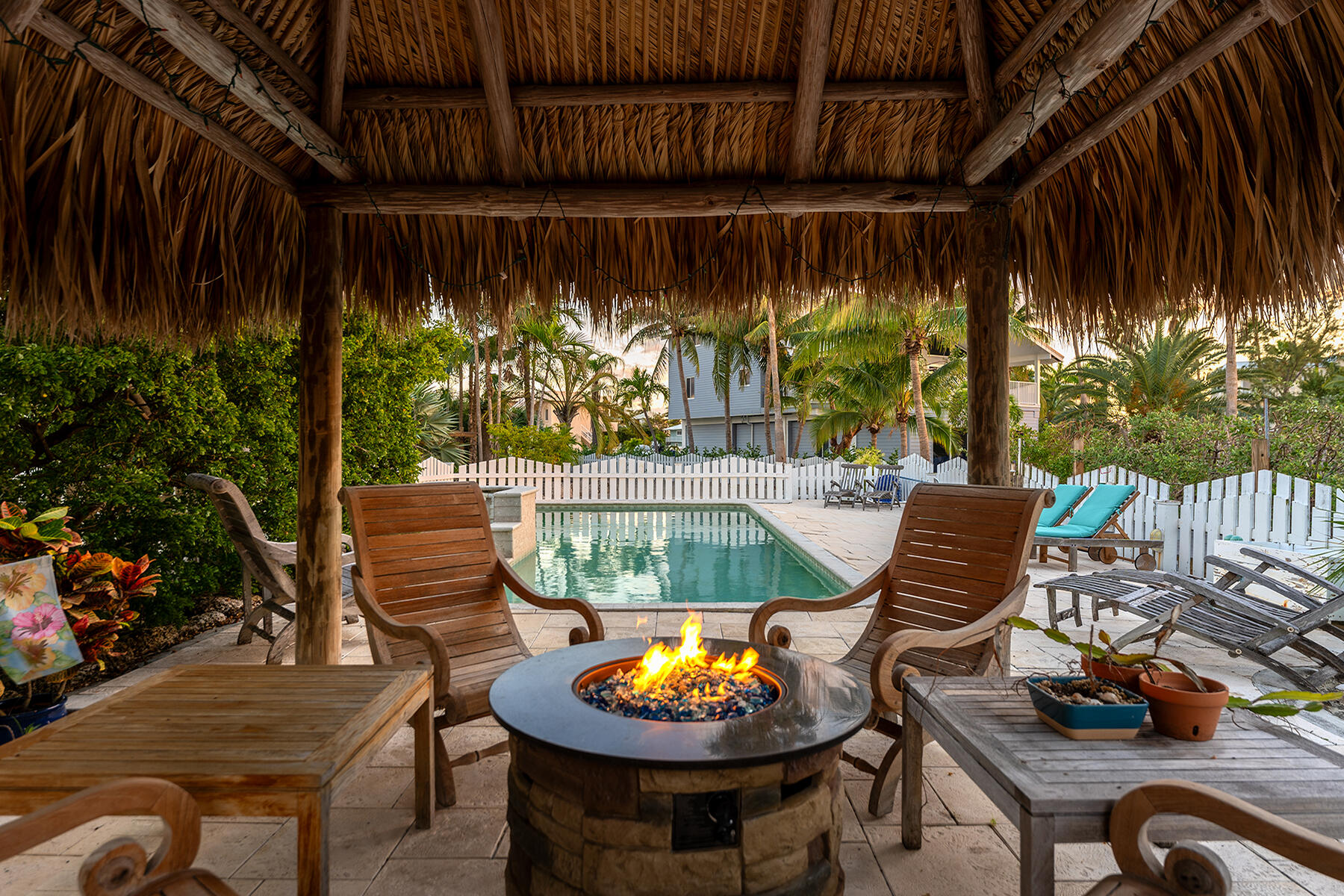 81 Mutiny Place Key Largo, FL 33037 - Photo 78 of 93 Tiki hut with fire pit next to the pool