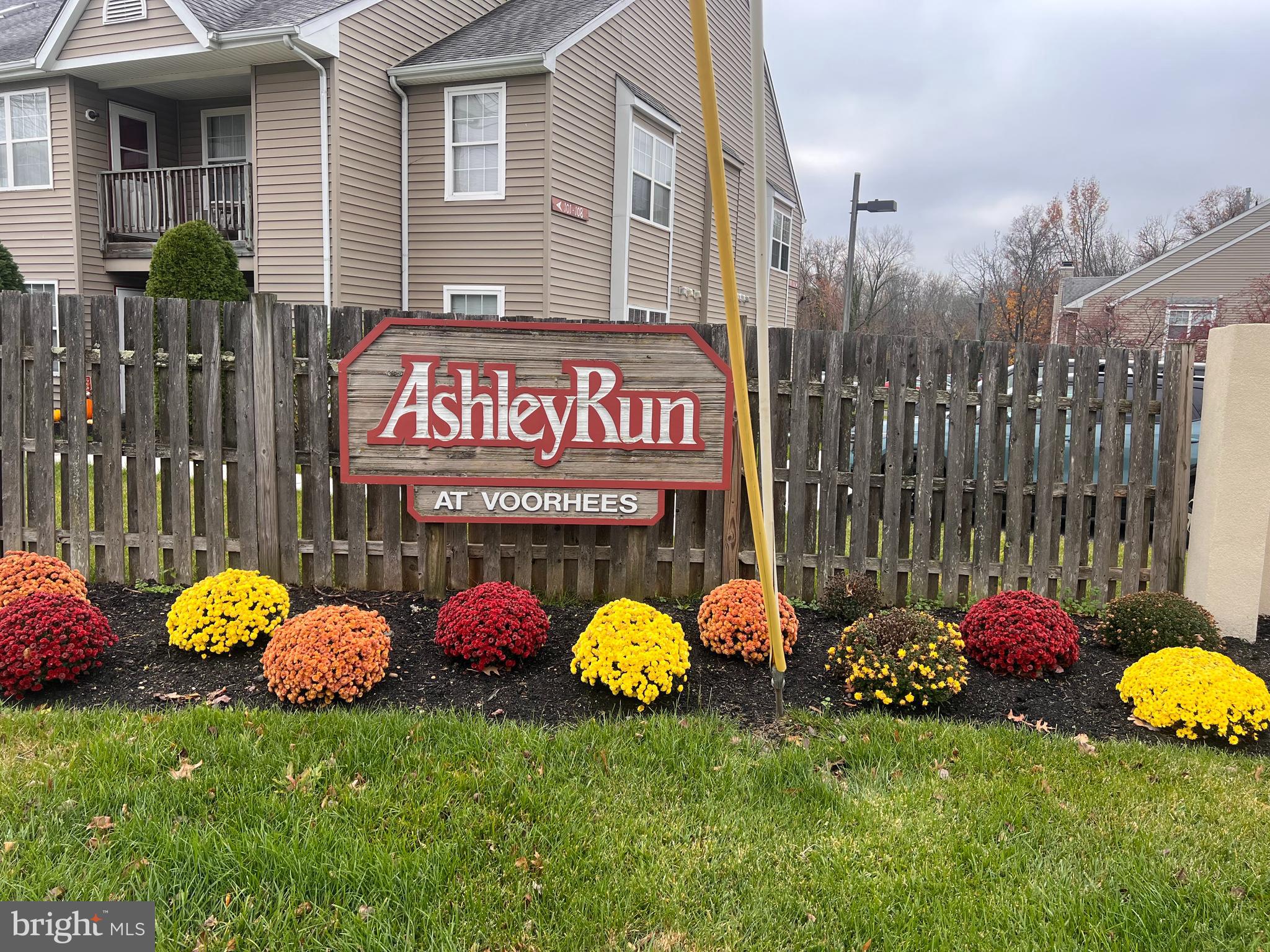 208 Ashley Run Voorhees, NJ 08043 - Photo 1 of 14 a sign that is in the middle of a building