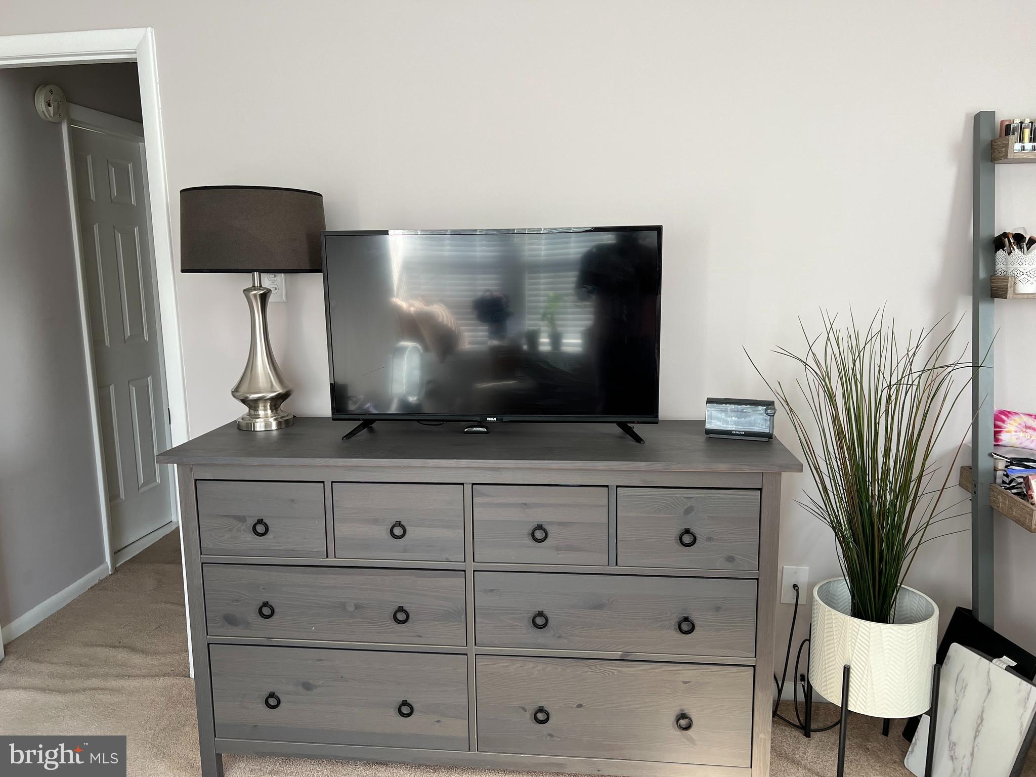 208 Ashley Run Voorhees, NJ 08043 - Photo 12 of 14 a living room with furniture and a flat screen tv