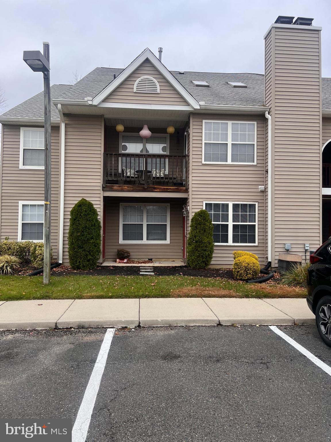 208 Ashley Run Voorhees, NJ 08043 - Photo 2 of 14 a front view of a house with a yard