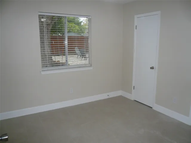 an empty room with a window