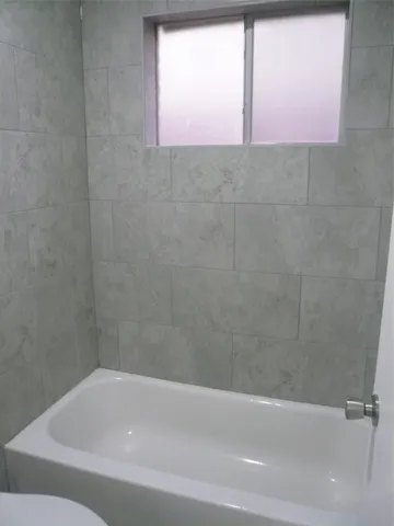 a bathroom with a bathtub