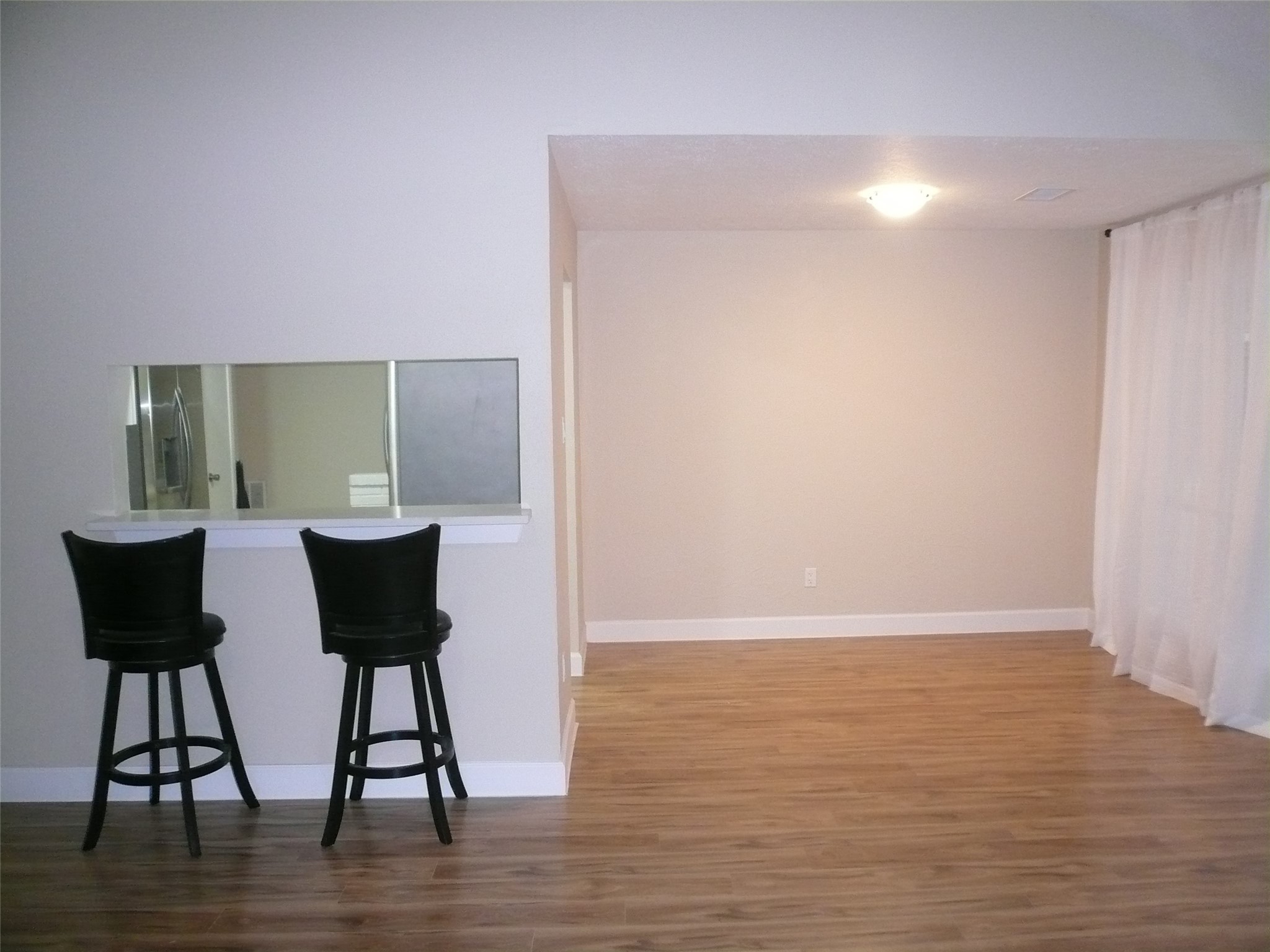 4910 Hennington Drive Spring, TX 77388 - Photo 8 of 18 a view of a chair and table in a room