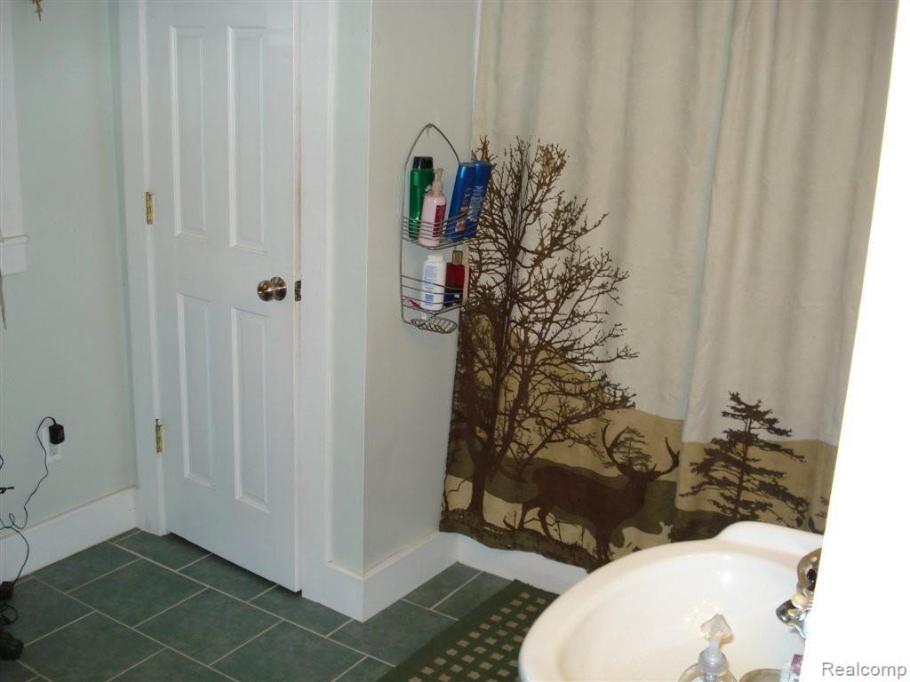 1123 Capac Road Allenton, MI 48002 - Photo 7 of 15 Bathroom 1x.JPG