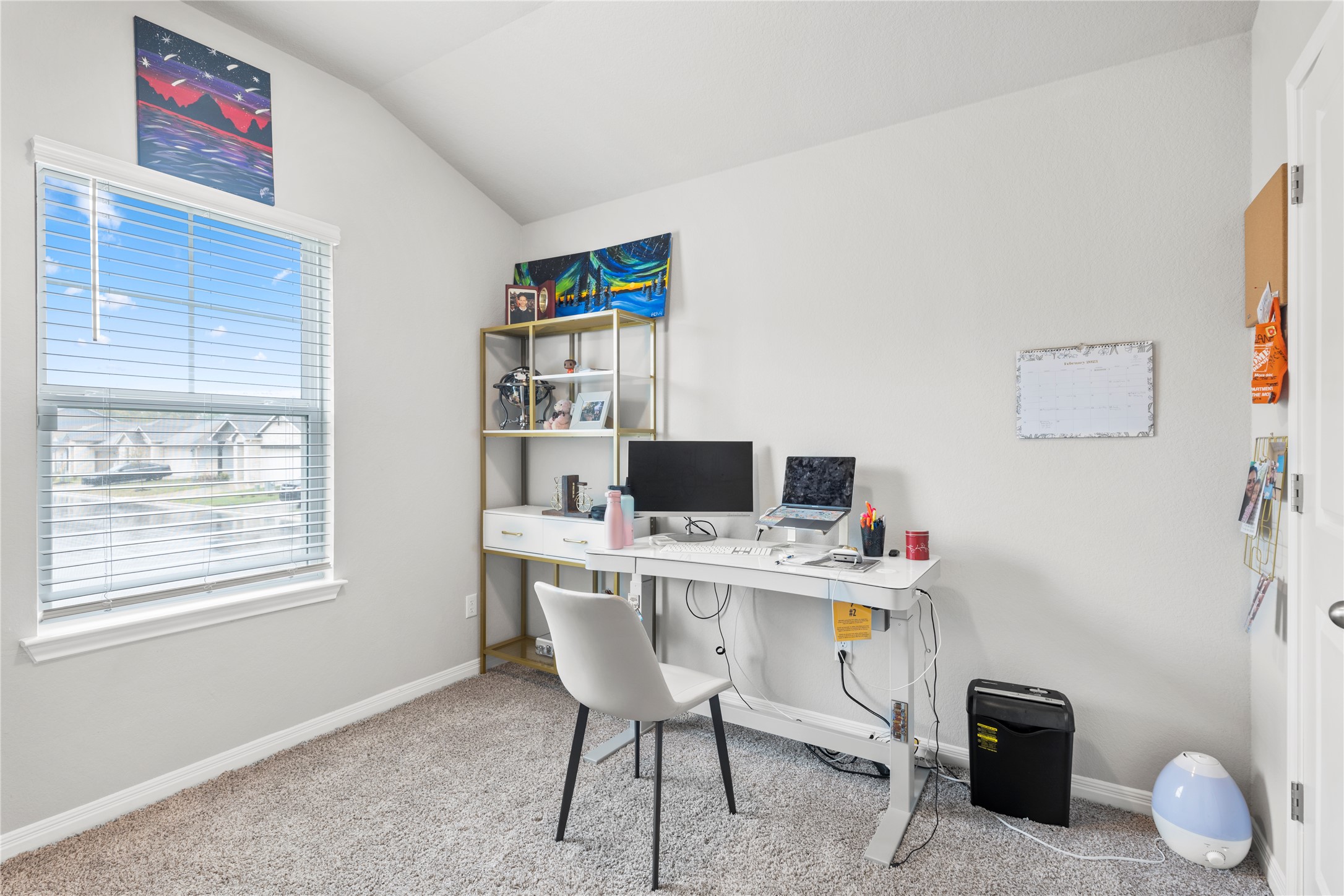 11701 Copperstone Avenue Austin, TX 78748 - Photo 21 of 29 Office area with light colored carpet and vaulted ceiling