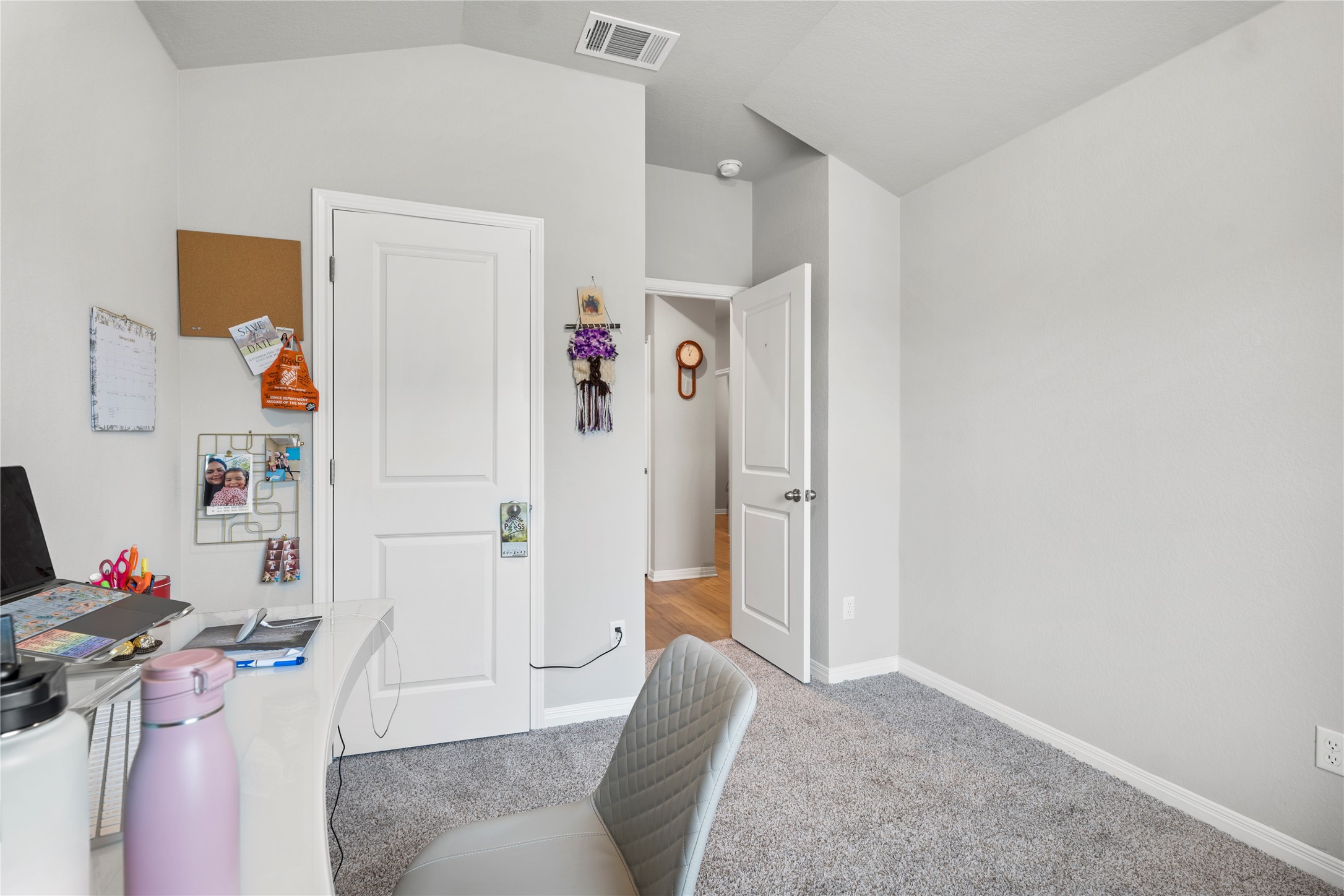 11701 Copperstone Avenue Austin, TX 78748 - Photo 22 of 29 Home office featuring light colored carpet and vaulted ceiling