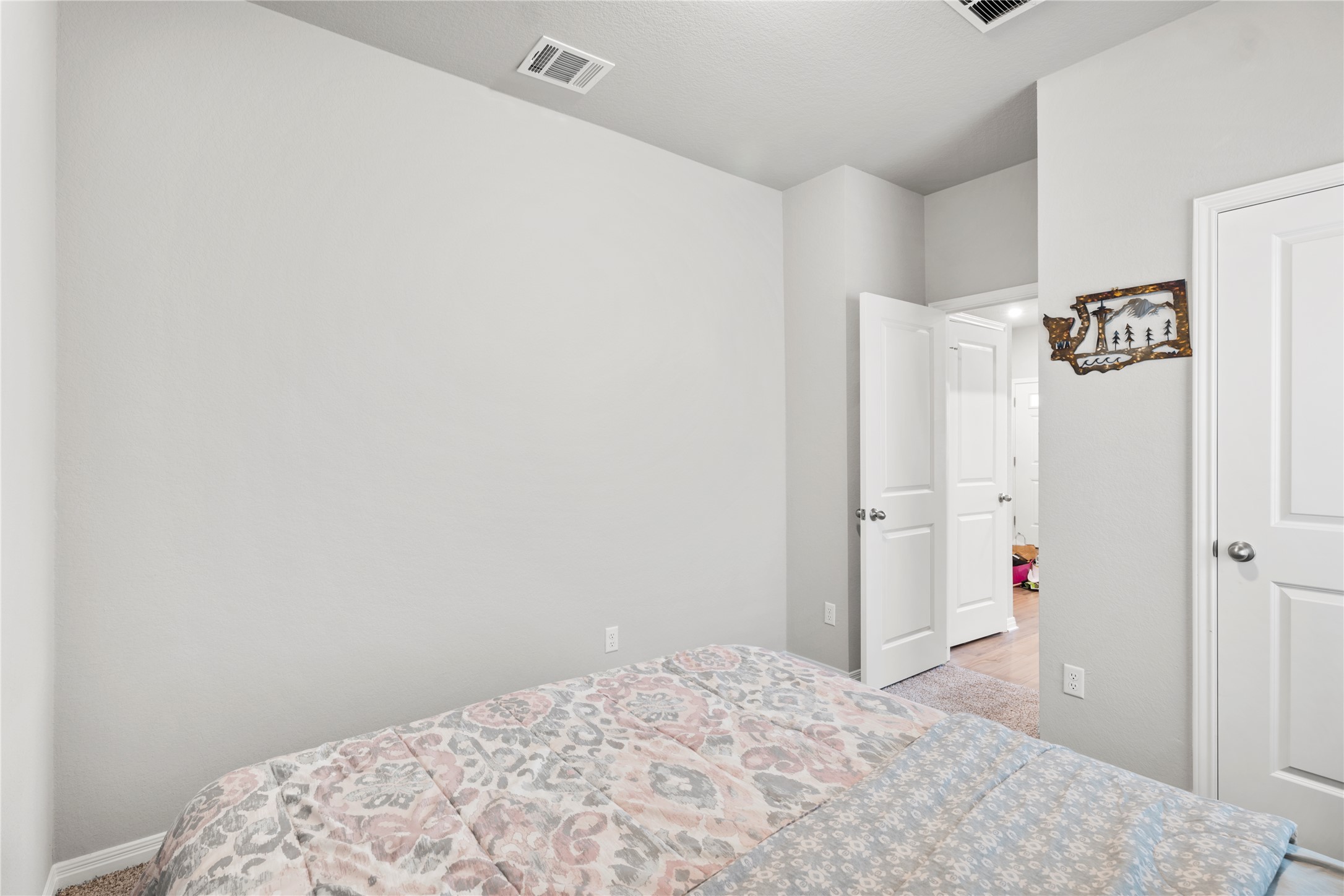 11701 Copperstone Avenue Austin, TX 78748 - Photo 25 of 29 Bedroom featuring baseboards and light carpet