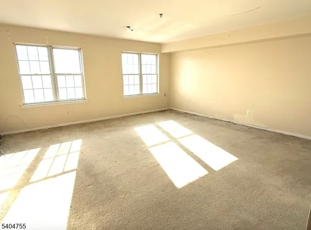 a view of a room with an empty space
