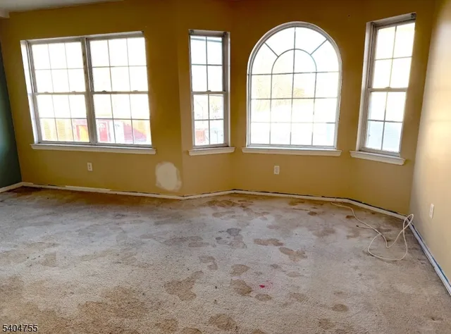 a bathroom with a toilet a sink and bathtub