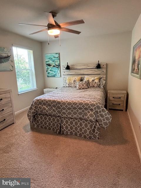 34152 Gooseberry Avenue Ocean View, DE 19970 - Photo 14 of 31 a bedroom with a bed and a window