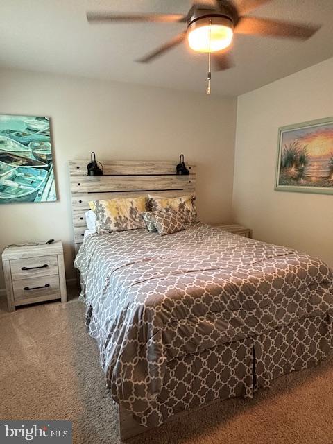34152 Gooseberry Avenue Ocean View, DE 19970 - Photo 15 of 31 a bedroom with a bed and a window