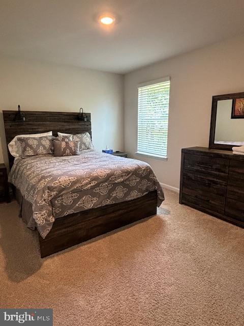 34152 Gooseberry Avenue Ocean View, DE 19970 - Photo 17 of 31 a bedroom with a bed and dresser