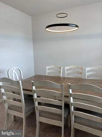 a view of a kitchen counter space and windows