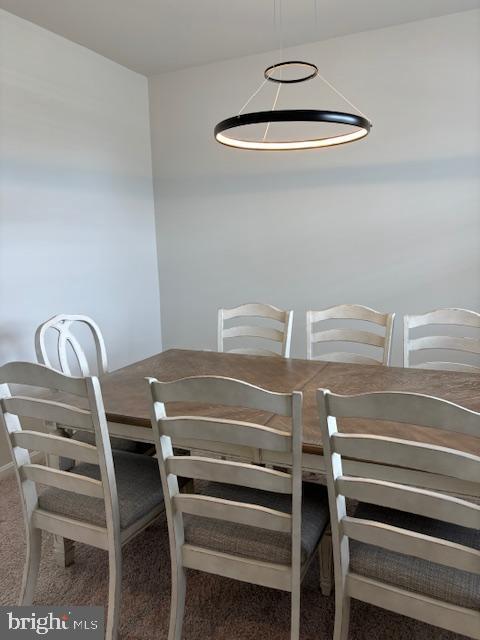 34152 Gooseberry Avenue Ocean View, DE 19970 - Photo 30 of 31 a view of a dining room with a table and chairs