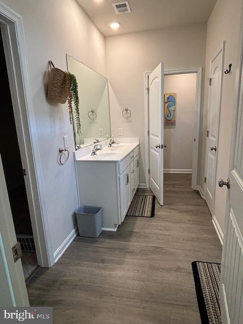 34152 Gooseberry Avenue Ocean View, DE 19970 - Photo 6 of 31 a bathroom with a sink and mirror