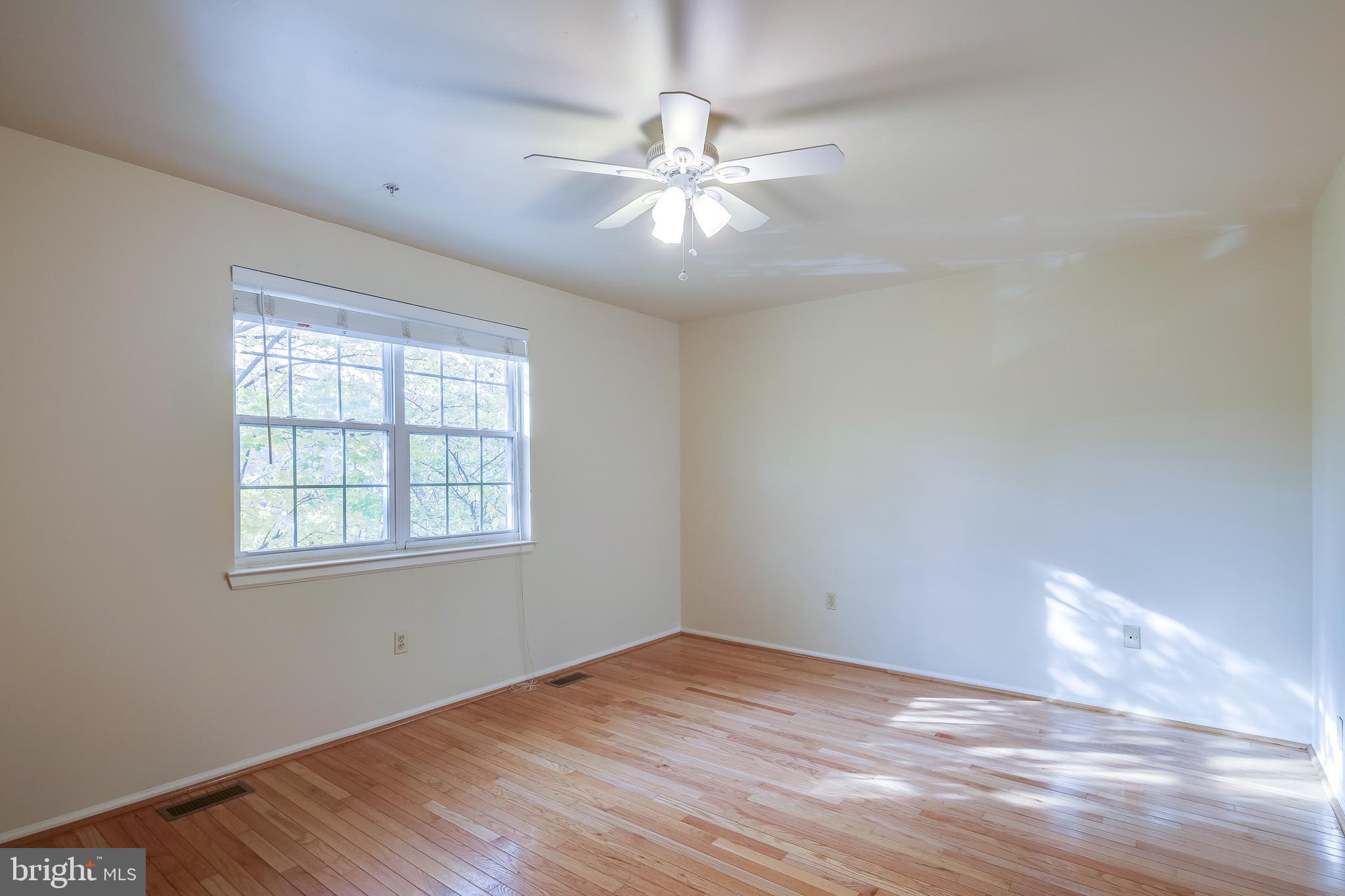 6347 Wind Rider Way Columbia, MD 21045 - Photo 13 of 36 LARGE PRIMARY BEDROOM WITH HARDWOODS