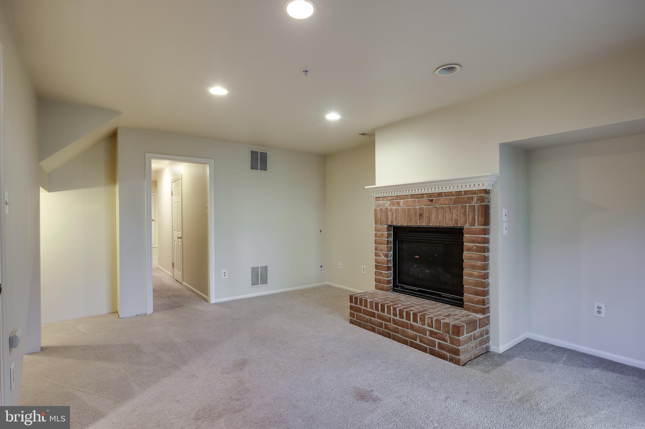 6347 Wind Rider Way Columbia, MD 21045 - Photo 21 of 36 LARGE FAMILY ROOM WITH GAS FIREPLACE