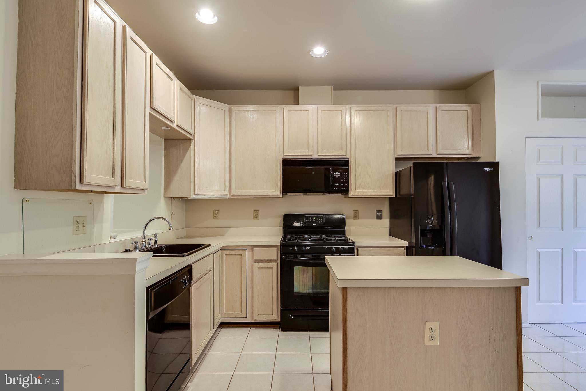 6347 Wind Rider Way Columbia, MD 21045 - Photo 7 of 36 LARGE KITCHEN WITH CENTER ISLAND