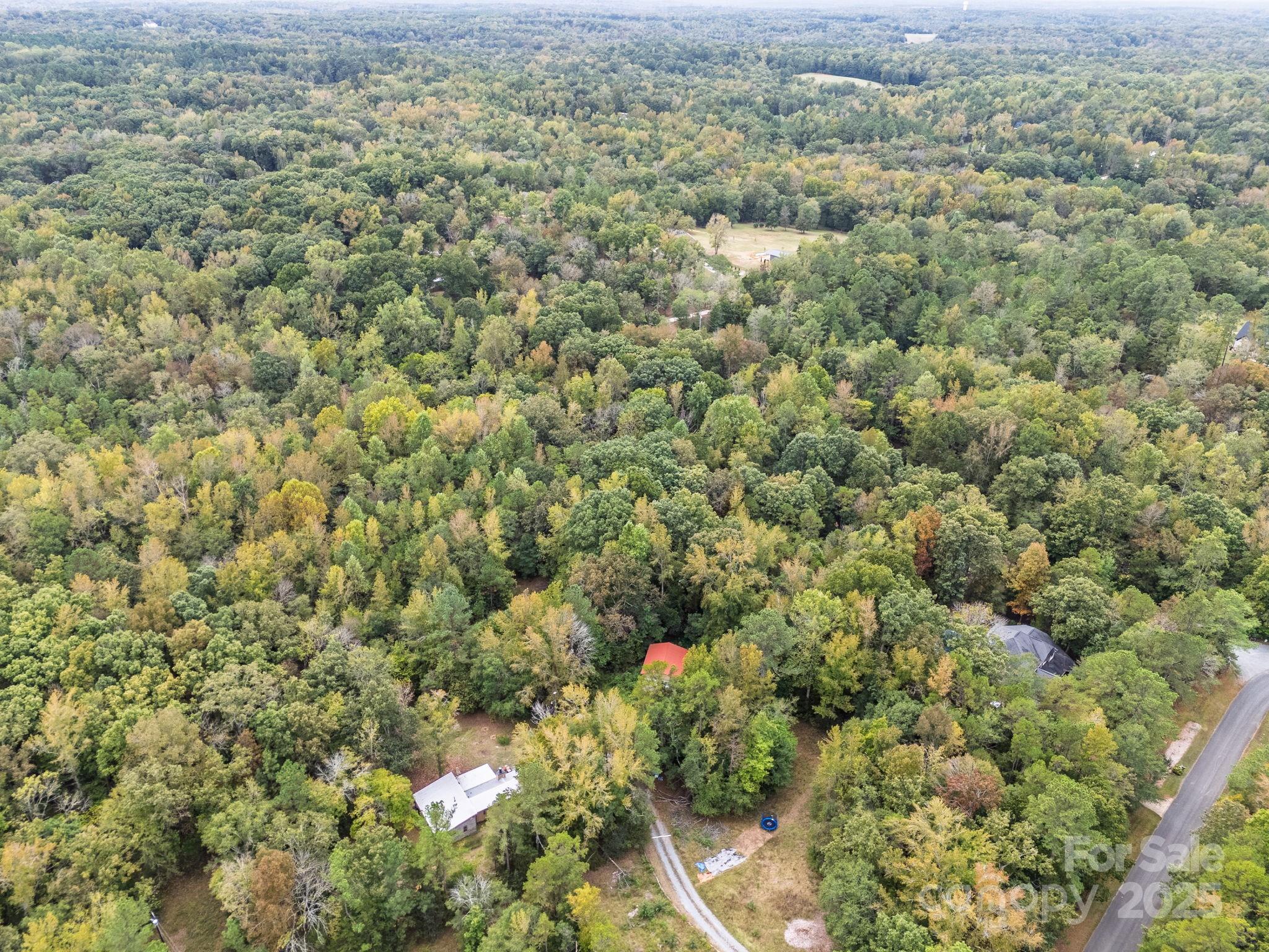 8001 Rillwood Drive Waxhaw, NC 28173 - Photo 11 of 16 an aerial view of a houses with yard