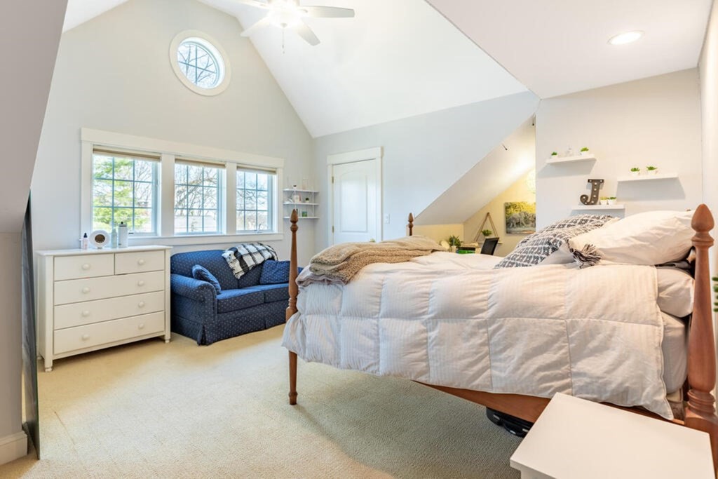 101 Clarke Circle Needham, MA 02492 - Photo 26 of 31 a bedroom with a bed and furniture