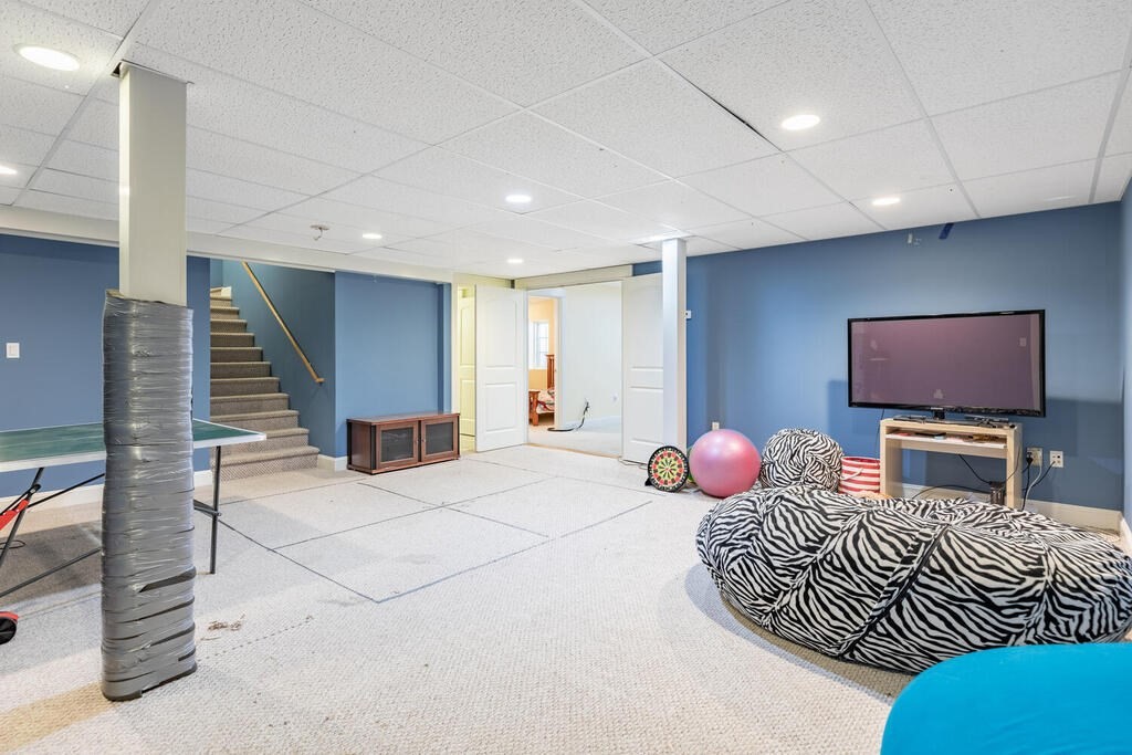 101 Clarke Circle Needham, MA 02492 - Photo 30 of 31 a living room with furniture