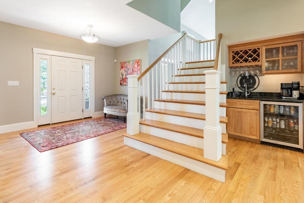 101 Clarke Circle Needham, MA 02492 - Photo 3 of 31 a view of entryway and hall with wooden floor