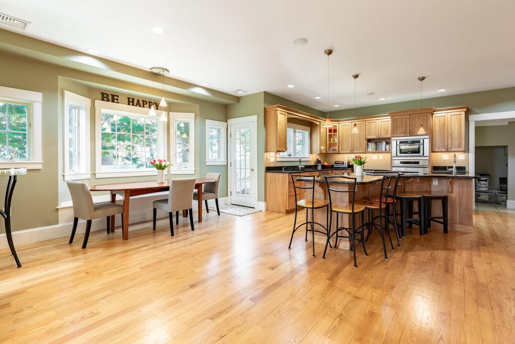 101 Clarke Circle Needham, MA 02492 - Photo 8 of 31 a view of a dining area with furniture window and outside view