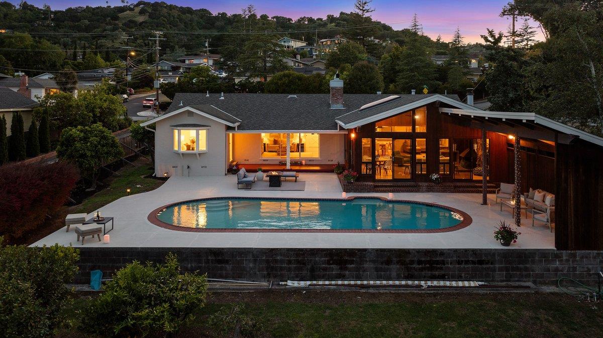 622 Terrace Road San Carlos, CA 94070 - Photo 2 of 83 a view of a house with a yard fire pit and outdoor seating