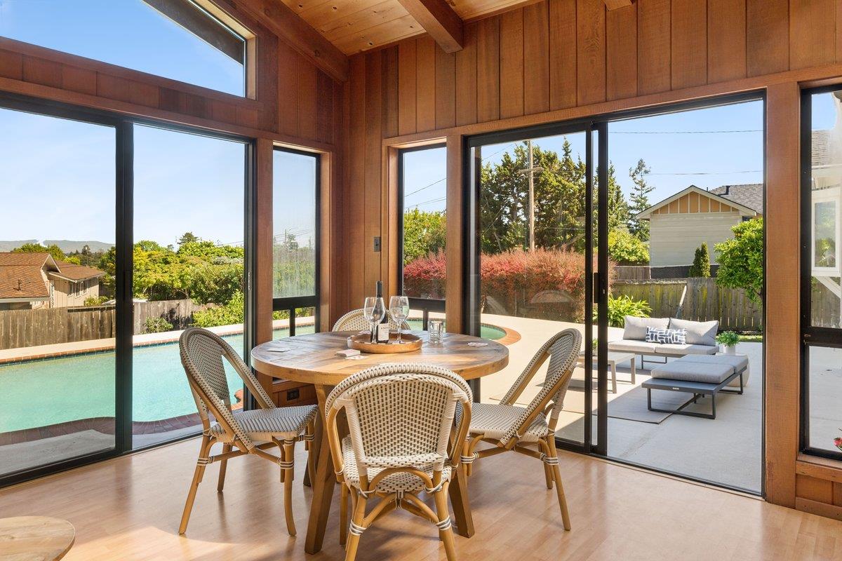 622 Terrace Road San Carlos, CA 94070 - Photo 25 of 83 a dining room with furniture and a floor to ceiling window
