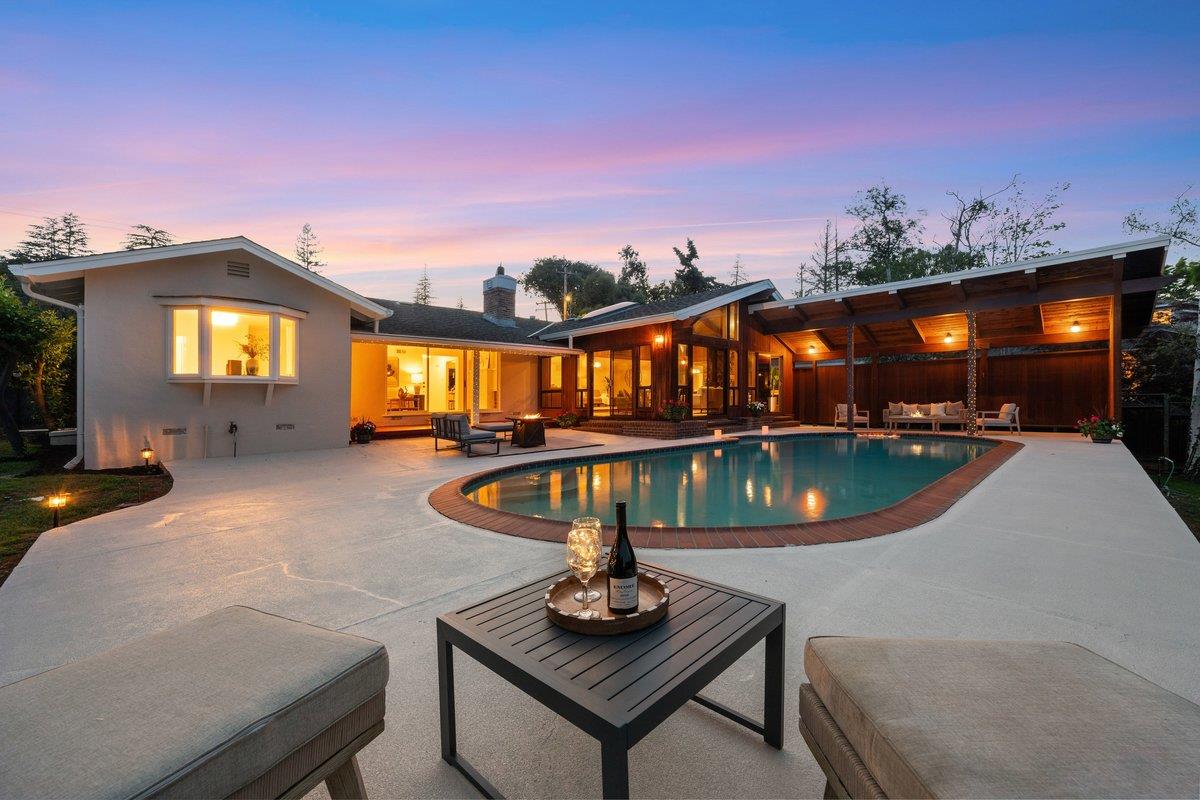 622 Terrace Road San Carlos, CA 94070 - Photo 3 of 83 a view of a swimming pool with a patio