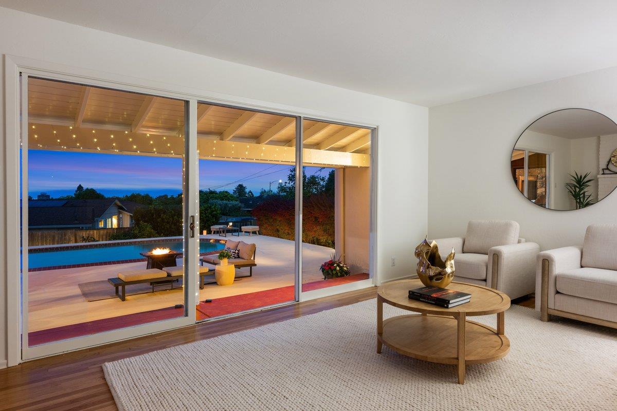 622 Terrace Road San Carlos, CA 94070 - Photo 41 of 83 a living room with couch and a floor to ceiling window