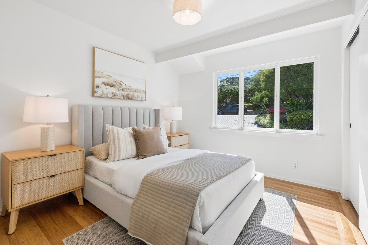 622 Terrace Road San Carlos, CA 94070 - Photo 51 of 83 a bedroom with a white bed and a large window