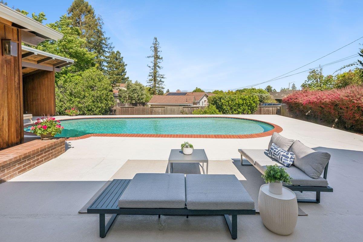 622 Terrace Road San Carlos, CA 94070 - Photo 62 of 83 a view of a patio with table and chairs and potted plants