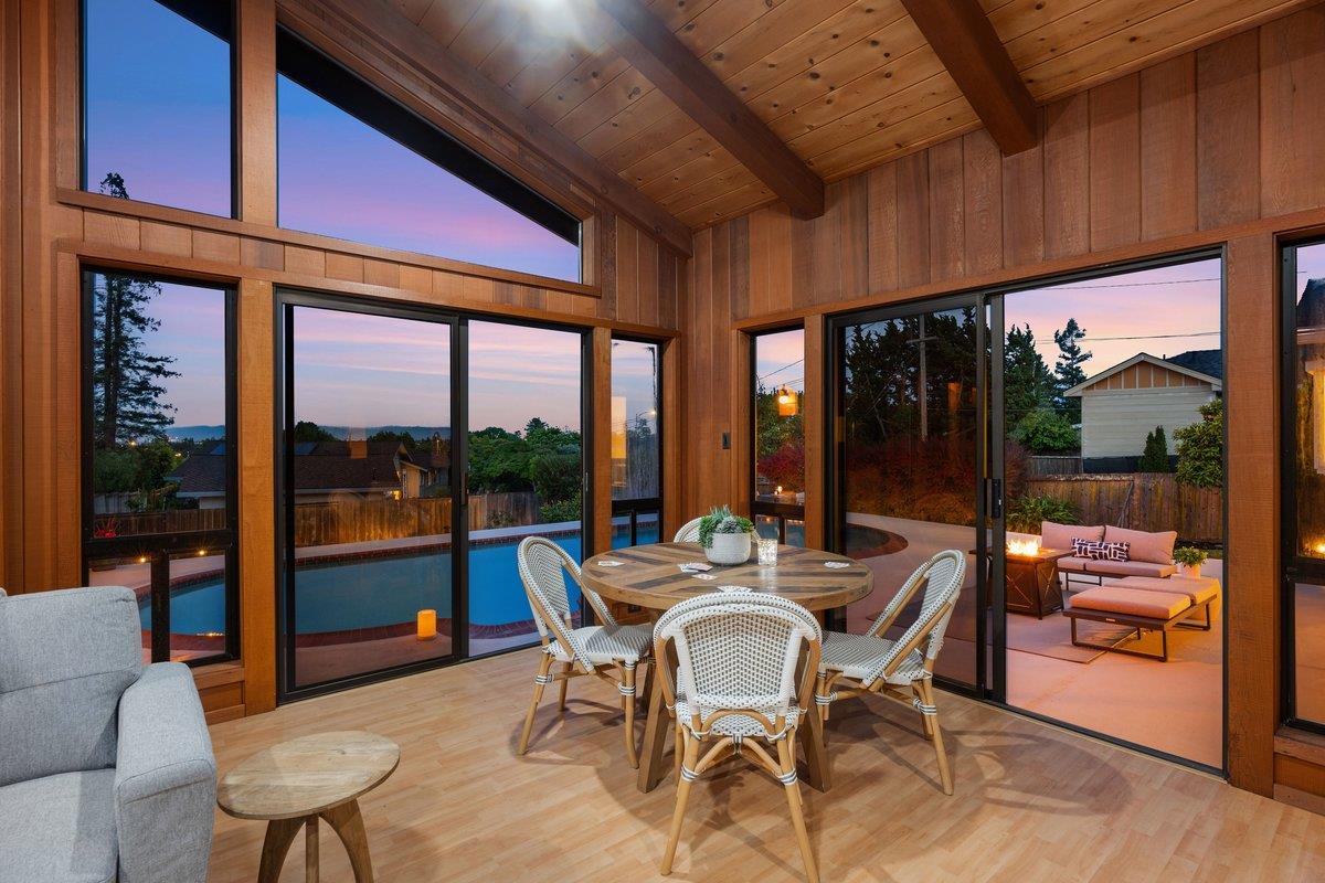 622 Terrace Road San Carlos, CA 94070 - Photo 9 of 83 a view of a dining room with furniture large windows and wooden floor