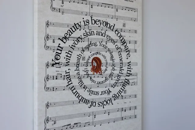 a bathroom with a sink and a large mirror