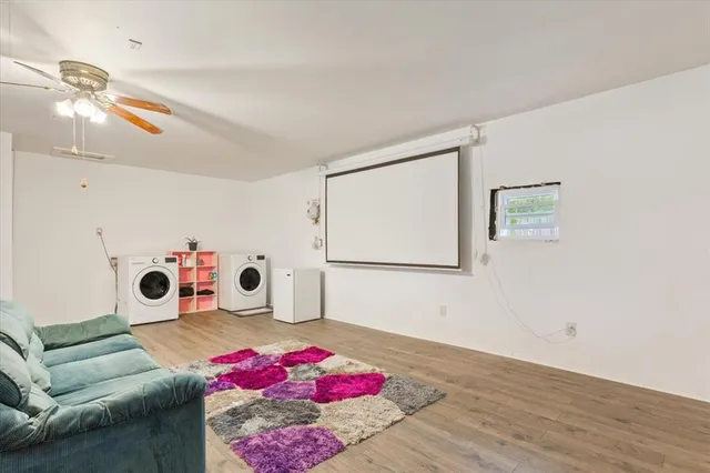 a bedroom with furniture and a chandelier