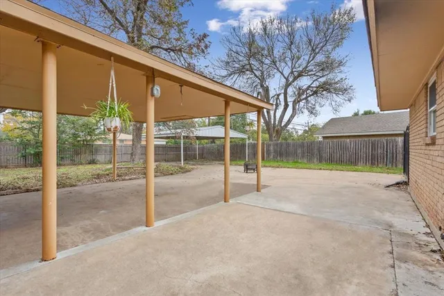 a view of backyard with green space