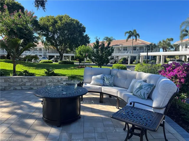 a view of a tables and chairs in patio