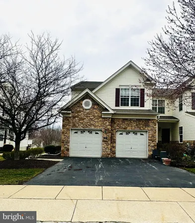 a front view of house with yard