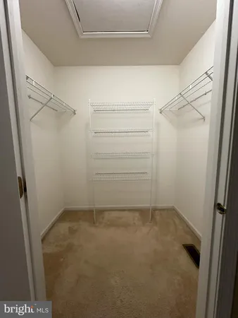 a spacious bathroom with a bathtub and shower