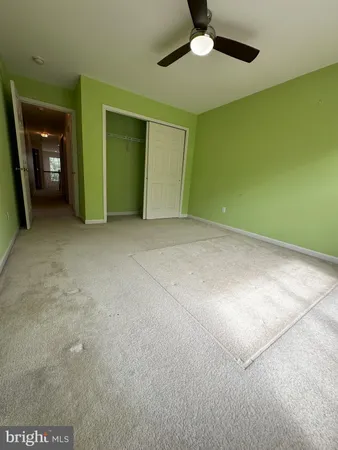 a view of a room with an empty space