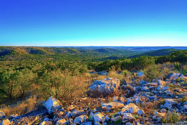 a view of a porch with wooden floor and outdoor space
