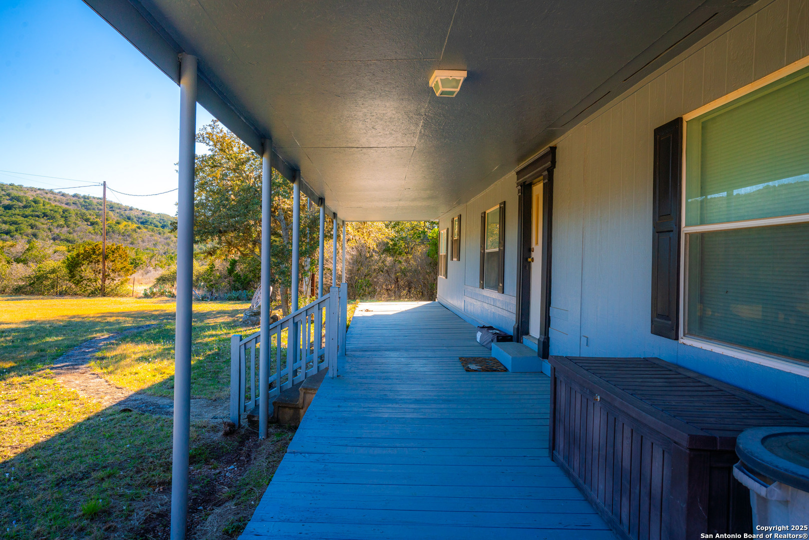 1659 Mesa Verde Sabinal, TX 78881 - Photo 32 of 38 a view of a porch with wooden floor and outdoor space