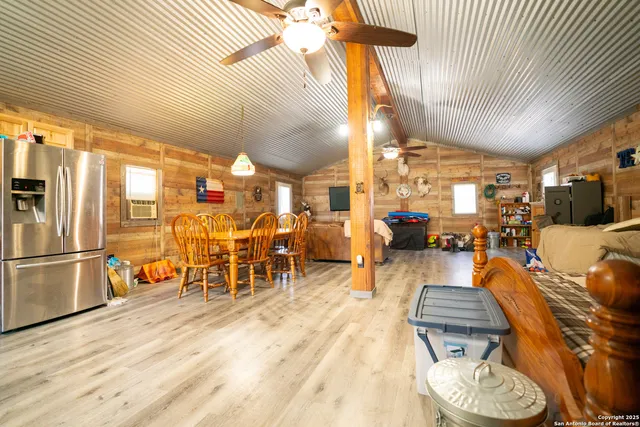 a bedroom with a bed and a mirror