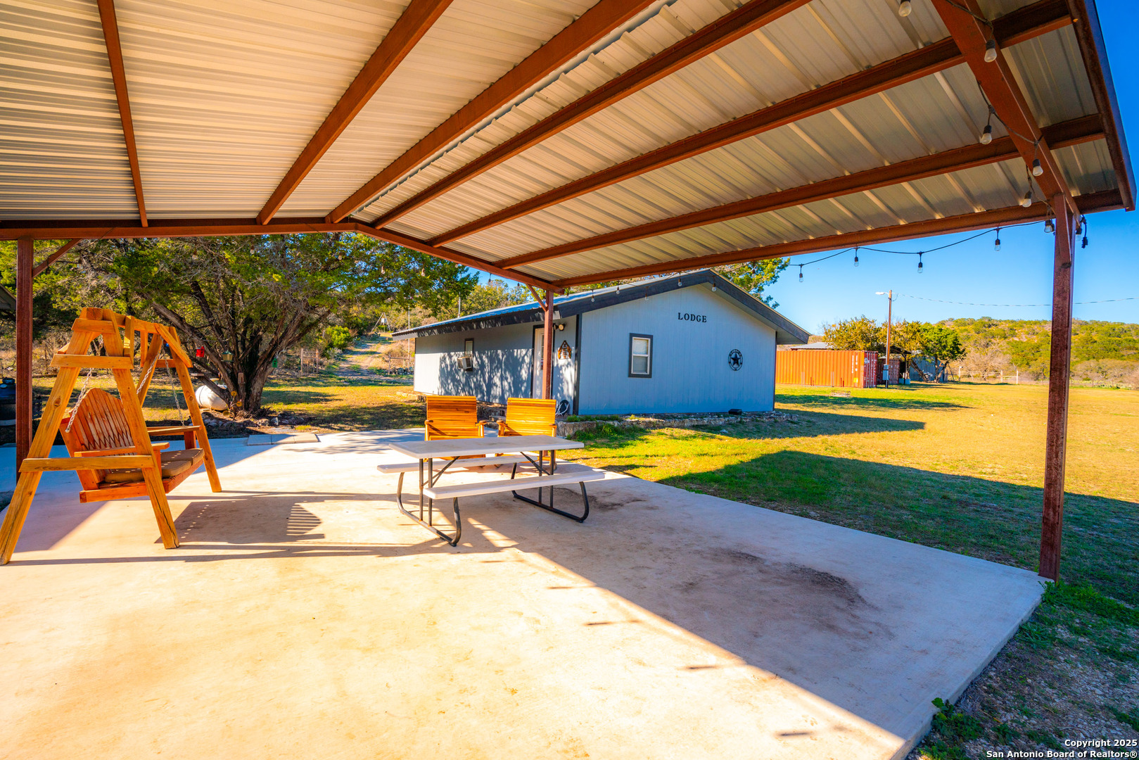 1659 Mesa Verde Sabinal, TX 78881 - Photo 5 of 38 a view of a swimming pool with a patio