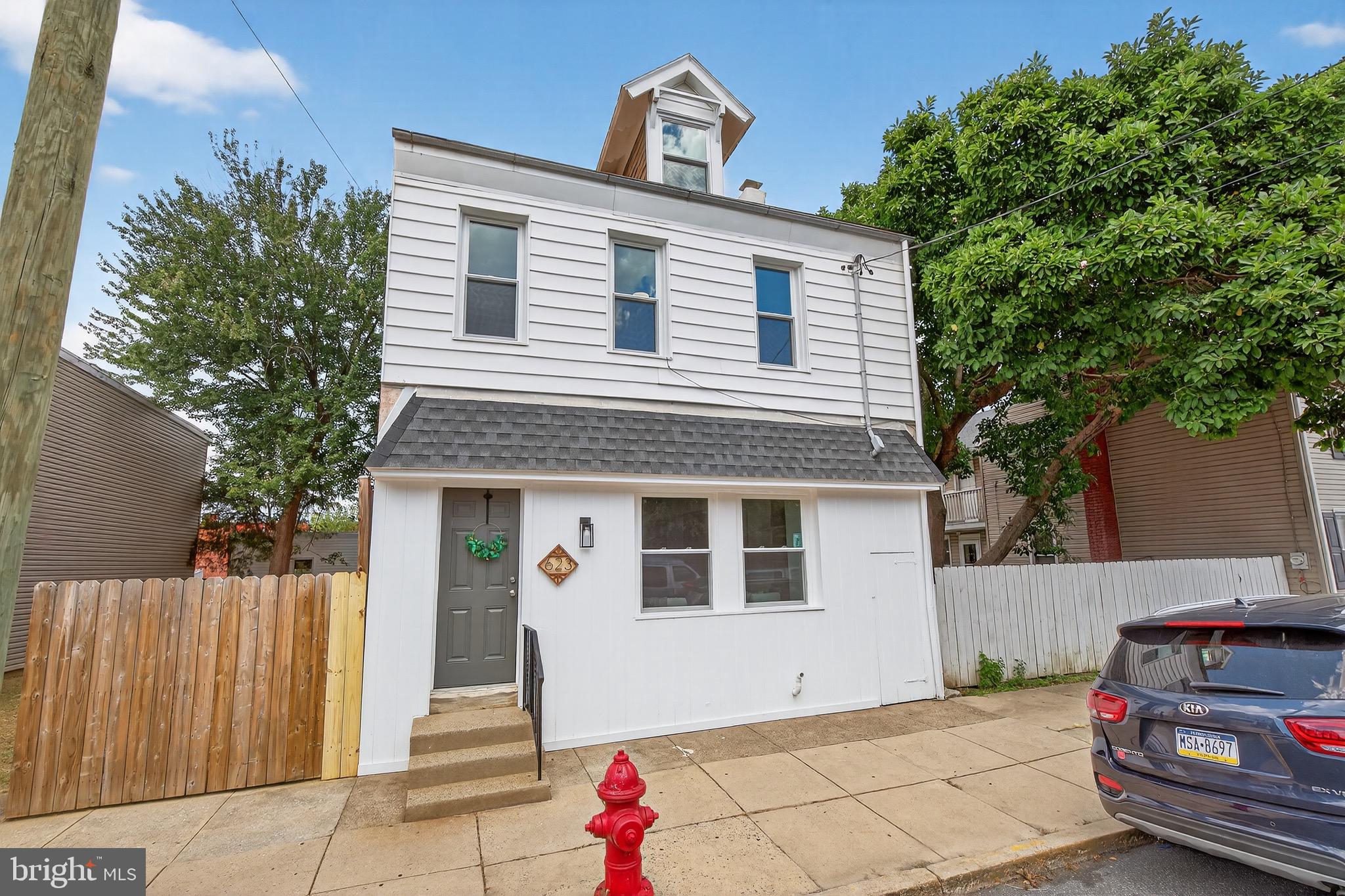 a front view of a house with a garage