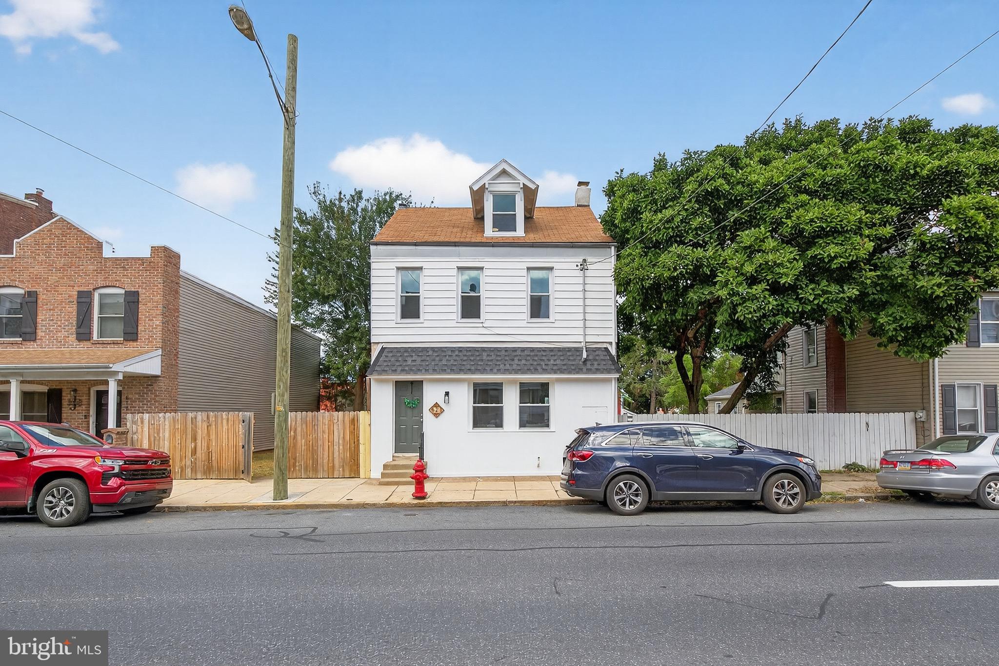623 East Chestnut Street Lancaster, PA 17602 - Photo 3 of 58 a view of a car parked in front of a house