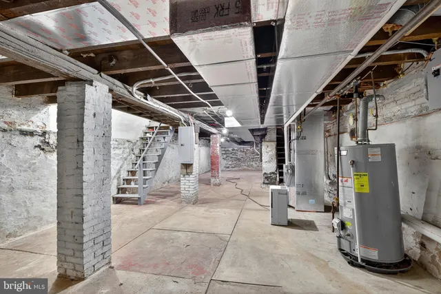 a view of a house with a yard and garage